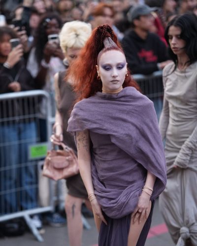 Chappell Roan in lavender gown featuring unique draping and texture