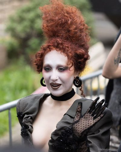 Chappell Roan in gray dress with contrasting textures