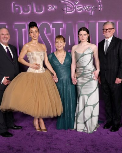 Chase Infiniti styled in elegant updo complementing her features.