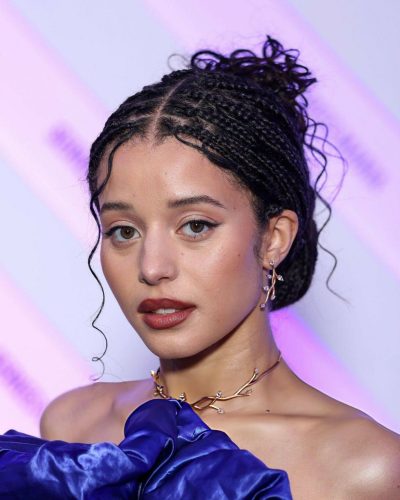 Chase Infiniti wearing vibrant blue off-shoulder gown.