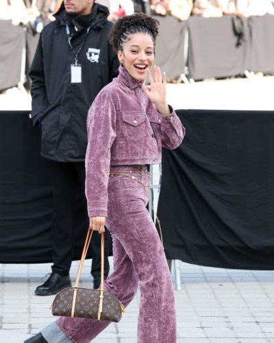 Chase Infinity in purple velvet matching set with structured design.