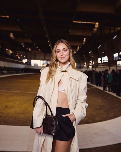 Chiara Ferragni beige trench coat, black shorts, and yellow heels