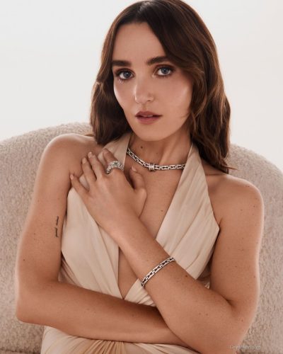 Chloe Fineman flowing cream top paired with fitted pants