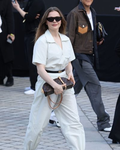 Chloe Moretz accessorized with iconic Louis Vuitton monogram.