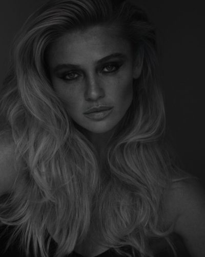 Cintia Dicker in an eye-catching gown adorned with sparkling gems