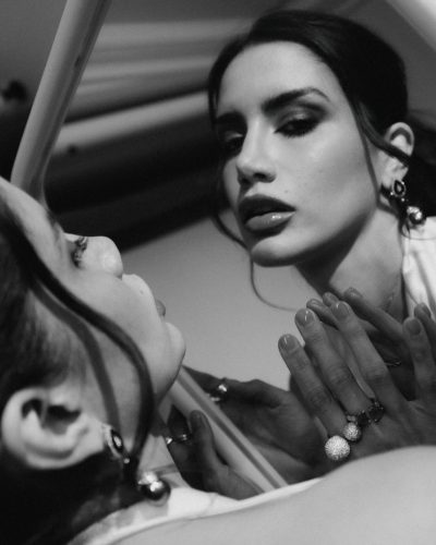 Claudia Coria a polished look with dark tones.