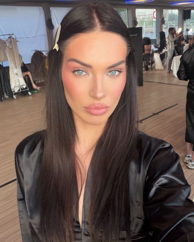 Daria Dereviankina glamorous gown featuring floral and shimmering elements