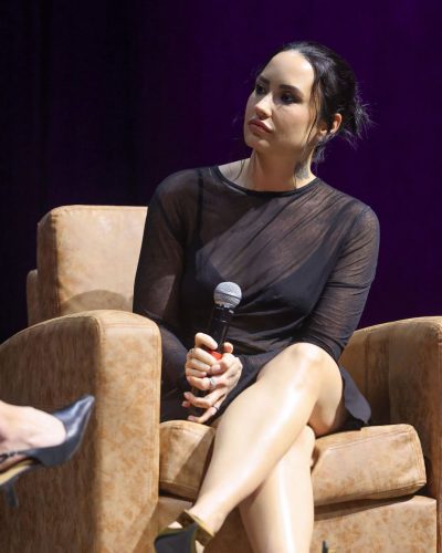 Demi Lovato wearing black dress at appearance 2023