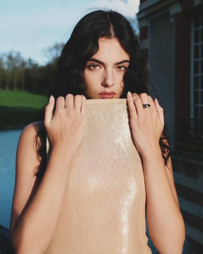 Deva Cassel in a comfortable floral dress with flowing silhouette