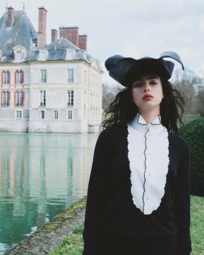 Deva Cassel wearing a floral dress with elegant neckline