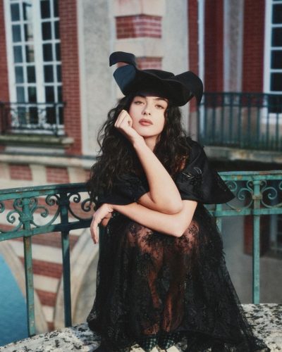 Deva Cassel in a chic floral dress with intricate patterns