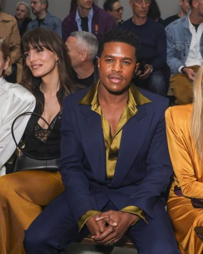 Diane Kruger mustard dress featuring long sleeves and bold color