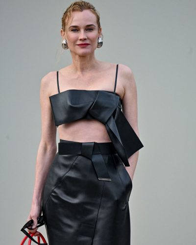Diane Kruger sleek high-waisted leather skirt accentuates figure
