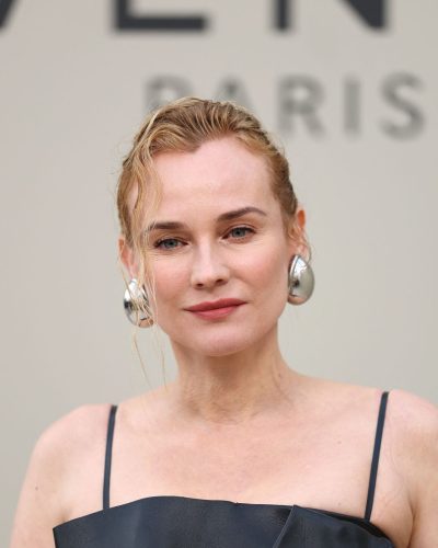 Diane Kruger red handbag adds pop of color to outfit