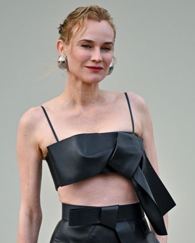 Diane Kruger high-waisted leather skirt paired with crop top