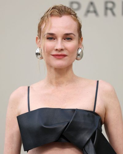 Diane Kruger chic black leather ensemble with striking accessories
