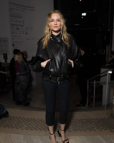 Diane Kruger black leather jacket complemented by stylish heels