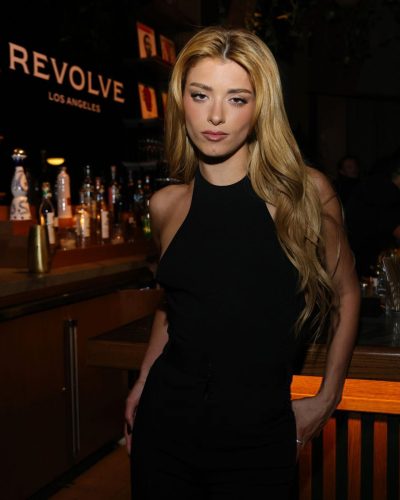 Dixie D’Amelio black jumpsuit with a sophisticated high neckline