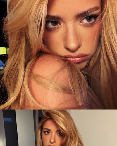 Dixie D'Amelio form-fitting black jumpsuit paired with minimal accessories