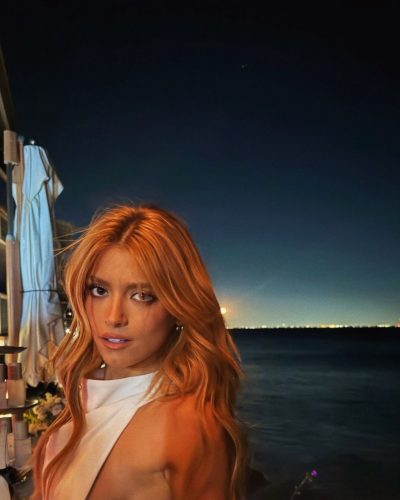 Dixie D'Amelio sleek black jumpsuit accentuating her figure perfectly