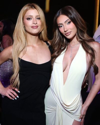 Dixie D’Amelio in chic black dress complemented by high heels