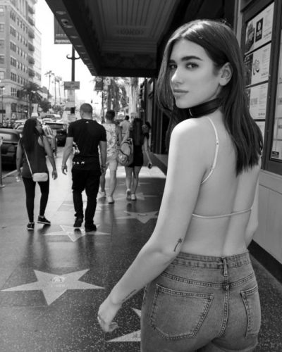 Dua Lipa wearing magazine look at appearance 2017