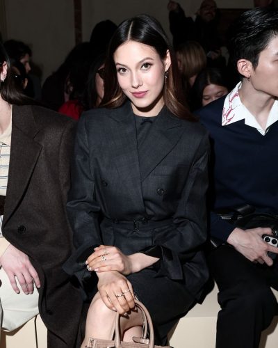 Eileen Gu in professional ensemble blending style and substance.