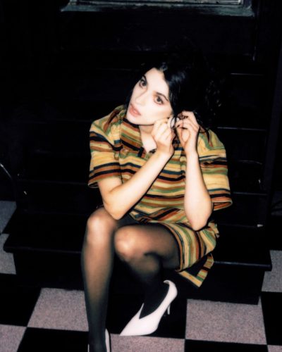 Ella Rubin in a captivating green evening dress