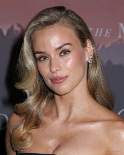 Elle Chapman wearing black dress at premiere 2023