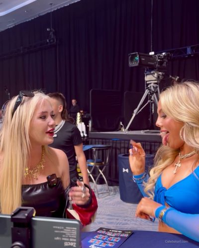 Ellie Blue wearing a chic blue jumpsuit with sparkling details