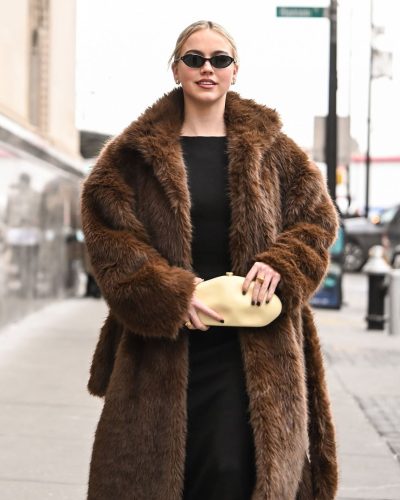 Emma Brooks classic black dress with luxurious brown fur
