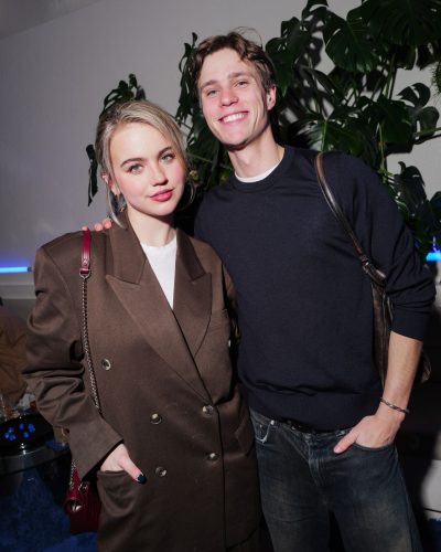 Emma Brooks brown double-breasted blazer with matching trousers.