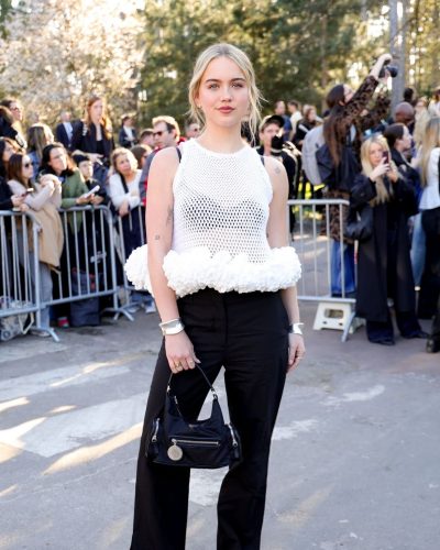 Emma Brooks stylish black handbag completing her fashion statement