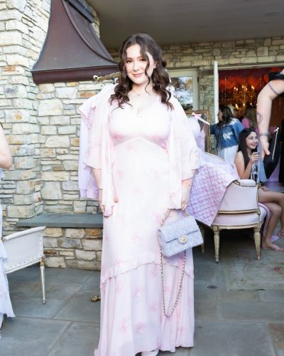 Emma Kenney wearing pink gown at appearance 2023