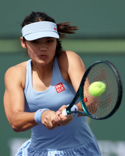 Emma Raducanu pleated skirt paired with fitted light blue top