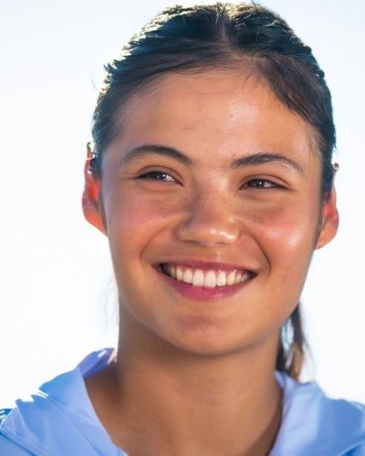 Emma Raducanu in casual blue hoodie and vibrant complexion