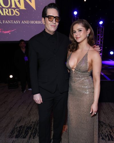 Erin Moriarty silver gown accentuating her figure