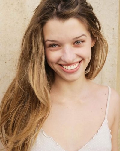 Ever Anderson in comfortable beige blouse with polka dots