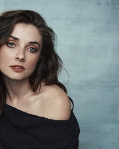 Giorgia Qingham in elegant black dress with eye-catching jewelry