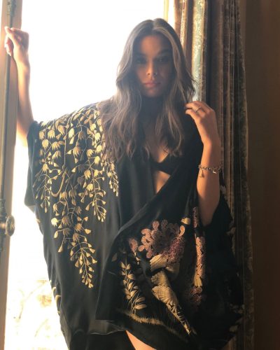 Hailee Steinfeld in black coat