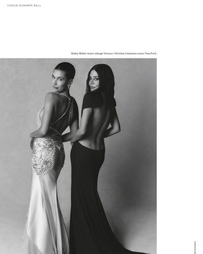 Hailey Bieber dressed in a sophisticated cream dress with beadwork