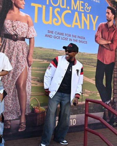 Halle Bailey oversized white tee with shoulder embellishments