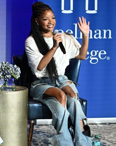 Halle Bailey relaxed oversized white t-shirt and stylish jeans