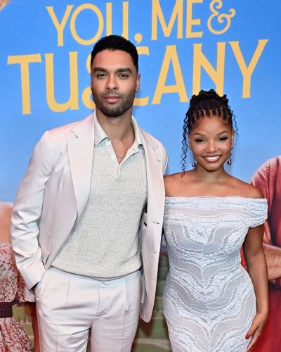 Halle Bailey in a chic white off-shoulder dress.