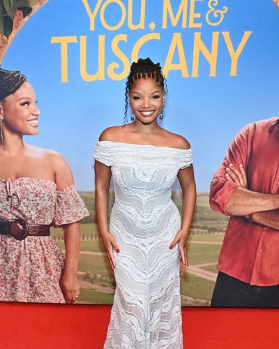 Halle Bailey in a radiant white evening gown.