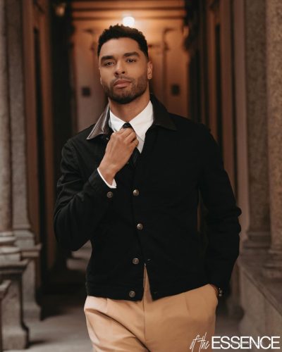 Halle Bailey in a white gown complemented by long flowing hair.