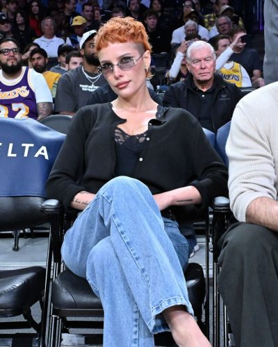 Halsey wearing chic black heels with high-waisted jeans