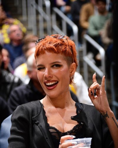 Halsey wearing black cardigan and intricate lace details