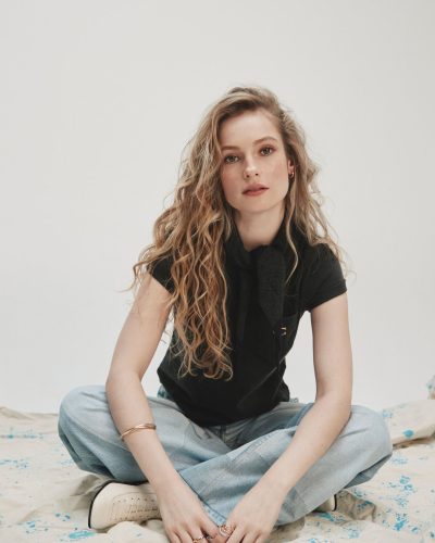 Hannah Dodd in fitted blazer complemented by soft blouse.