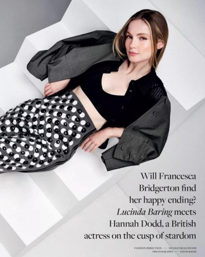 Hannah Dodd in a minimalist black dress paired with strappy heels.